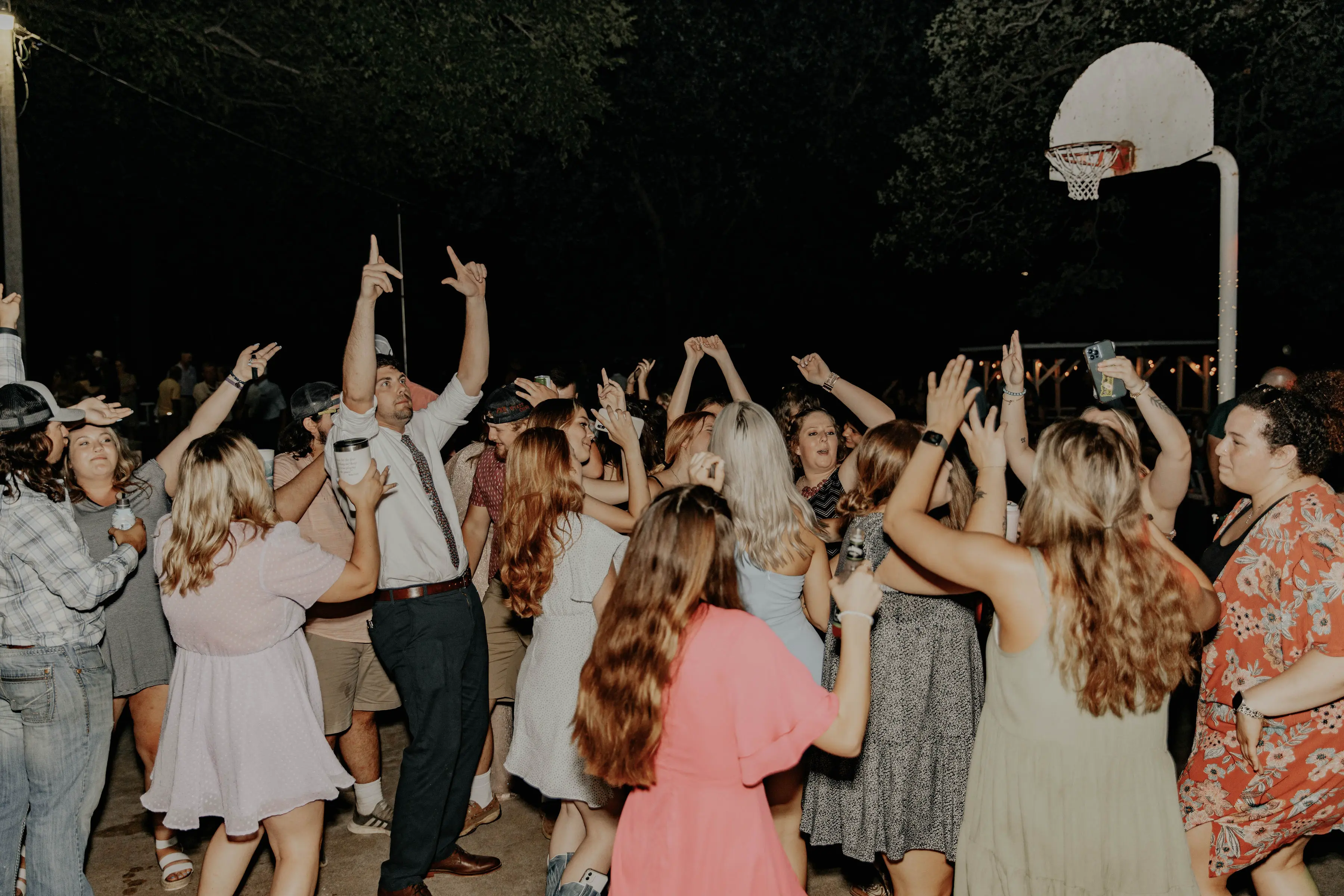 Wedding reception dance floor with DJ lighting in Wichita